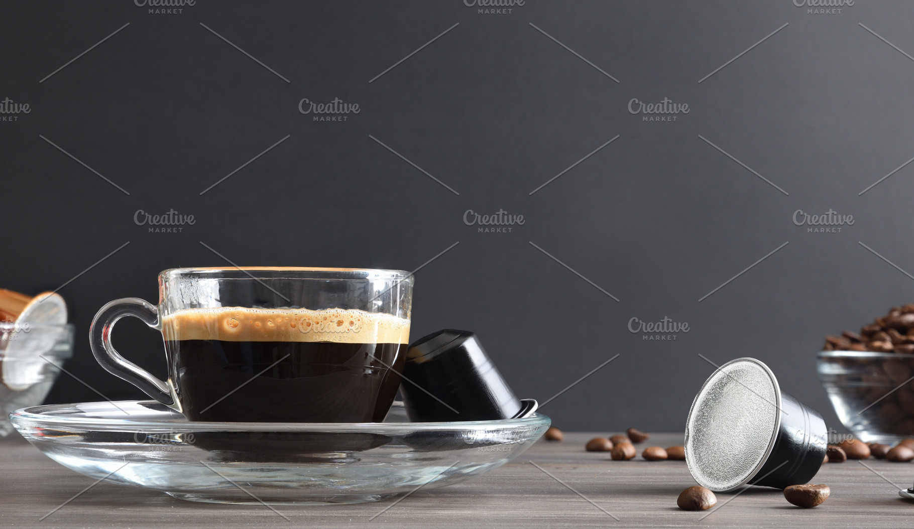 Espresso coffee on wooden table with capsules and isolated backg, a Food & Drink Photo by Davizro's Market