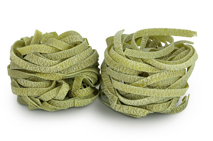 Raw tagliatelle green pasta with, a Food & Drink Photo by NataPhoto