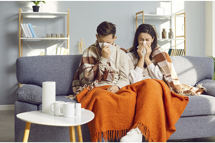 Sick couple covered in blankets, a Person Photo by StudioRomantic