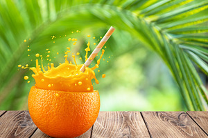 Orange as a glass with splashing, a Food & Drink Photo by Volff