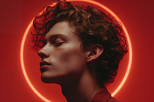 Creative man portrait showcasing profile with vivid red background, a Person Photo by OSORIOartist