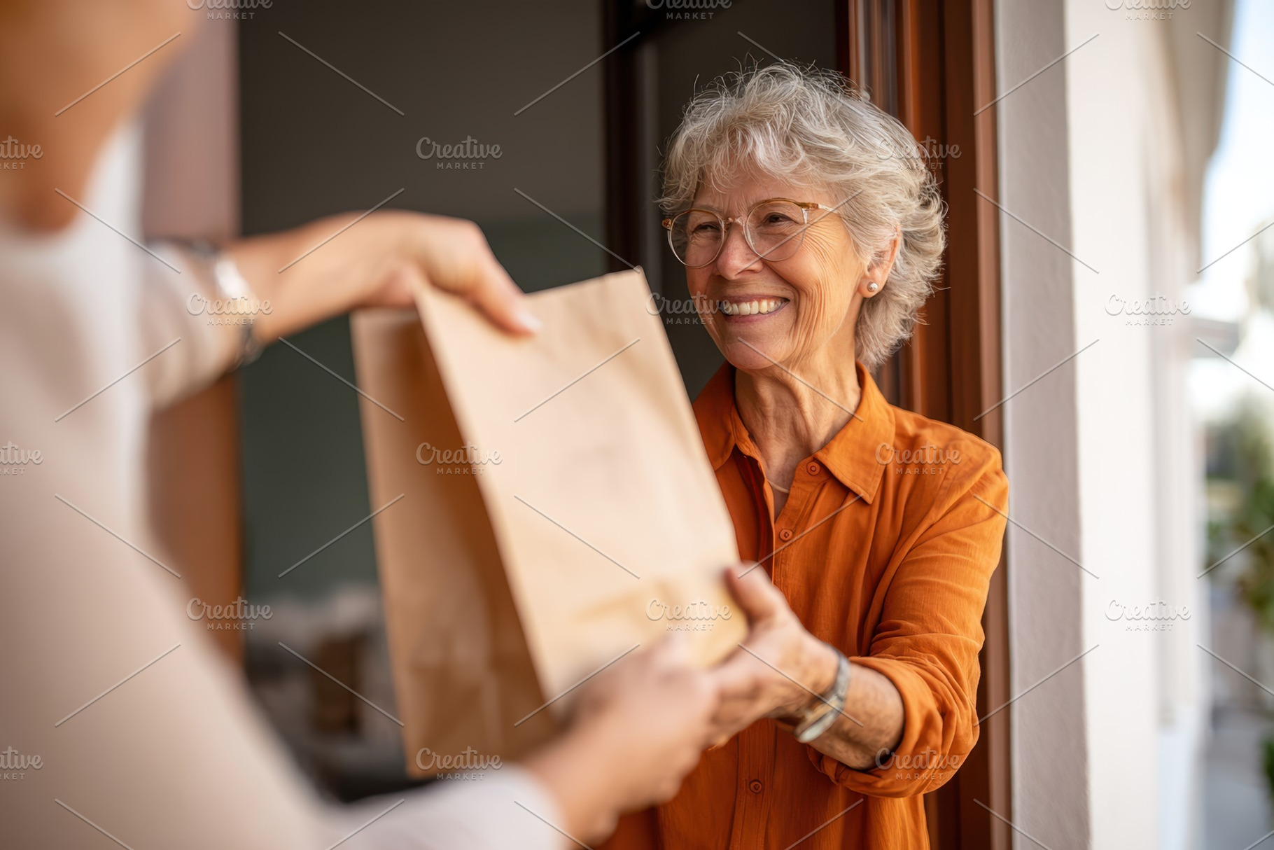 Elderly woman receiving a delivery with a smile, a Person Photo by AlyaAnd