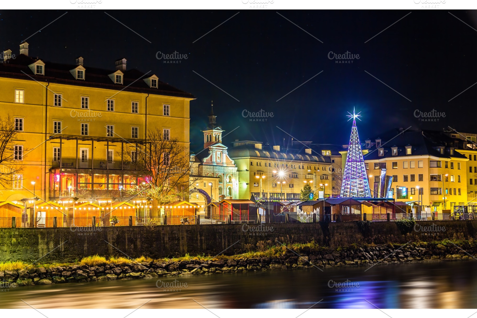 View of a Christmas market in Innsbruck - Austria, an Architecture Photo by Leonid Andronov