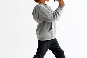 Young boy shouting into a megaphone, a Person Photo by MistyDay