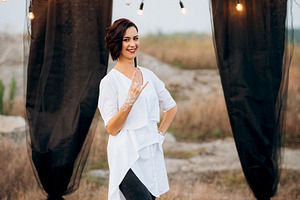 non-standard wedding ceremony in a stone quarry field, a Person Photo by Weddings, People, Travel