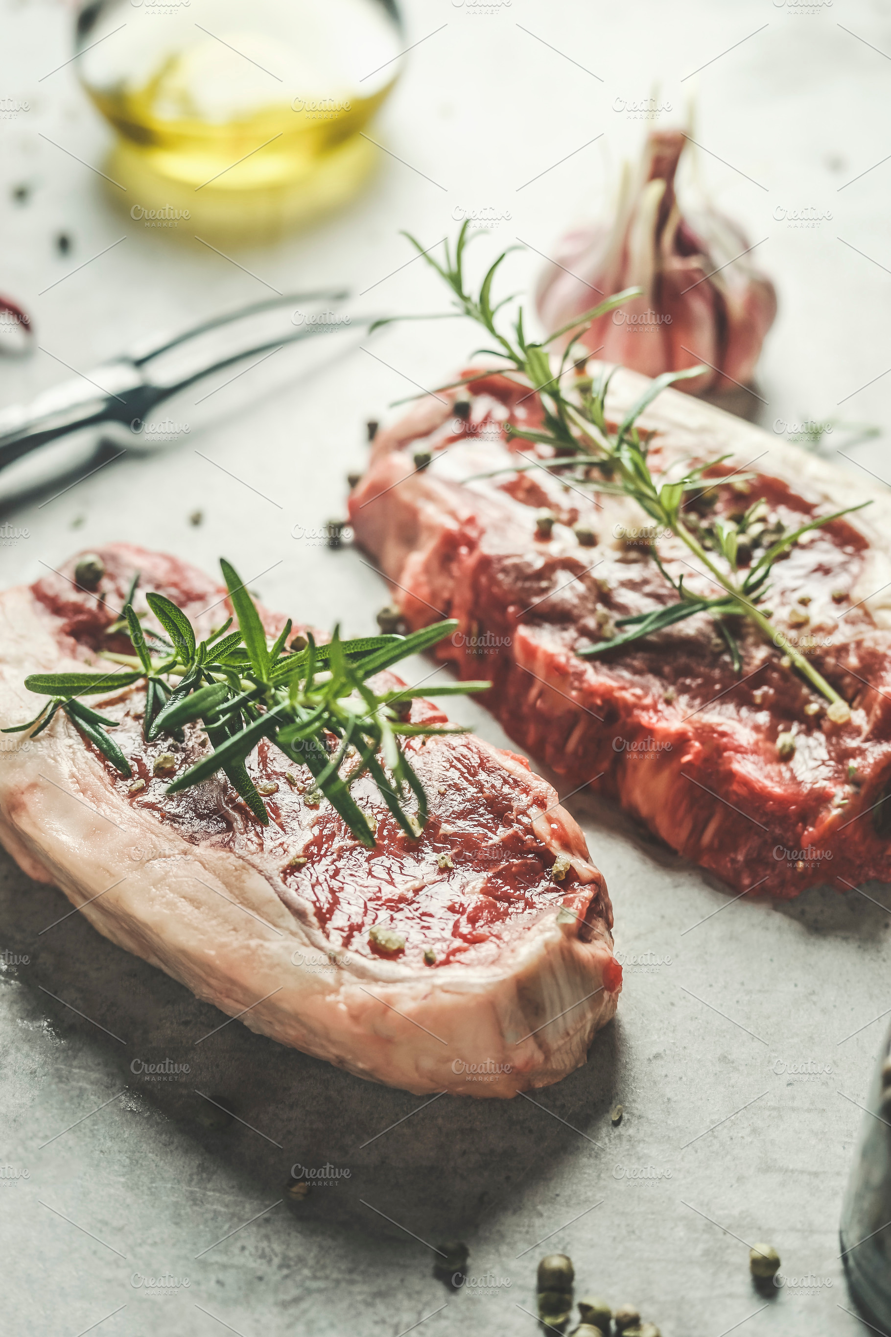 Close up of raw beef steak, a Food & Drink Photo by VICUSCHKA