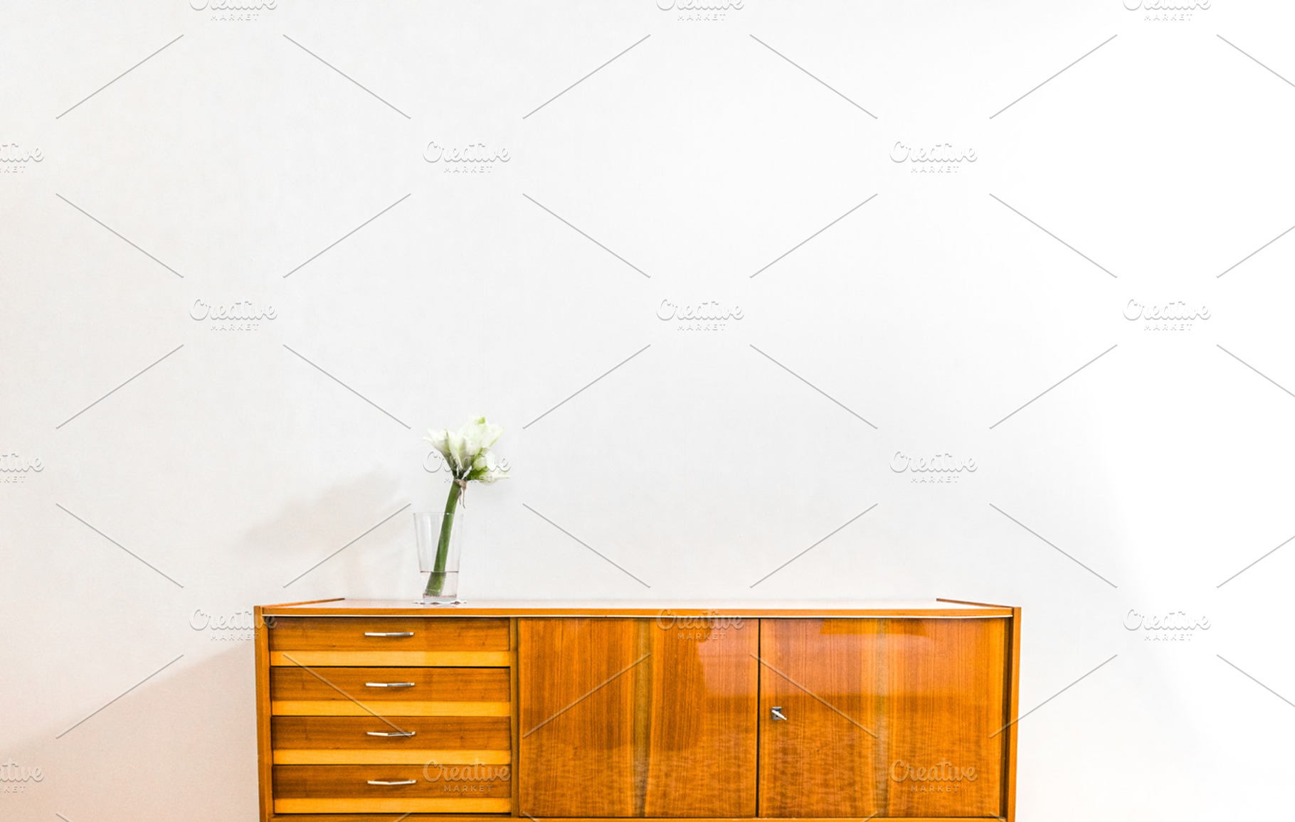 Sideboard with flower, an Abstract Photo by Nex Apher