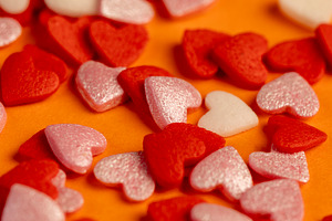 candy hearts made of sugar, candies are used to decorate pastries close up, a Photo by rsoollAI