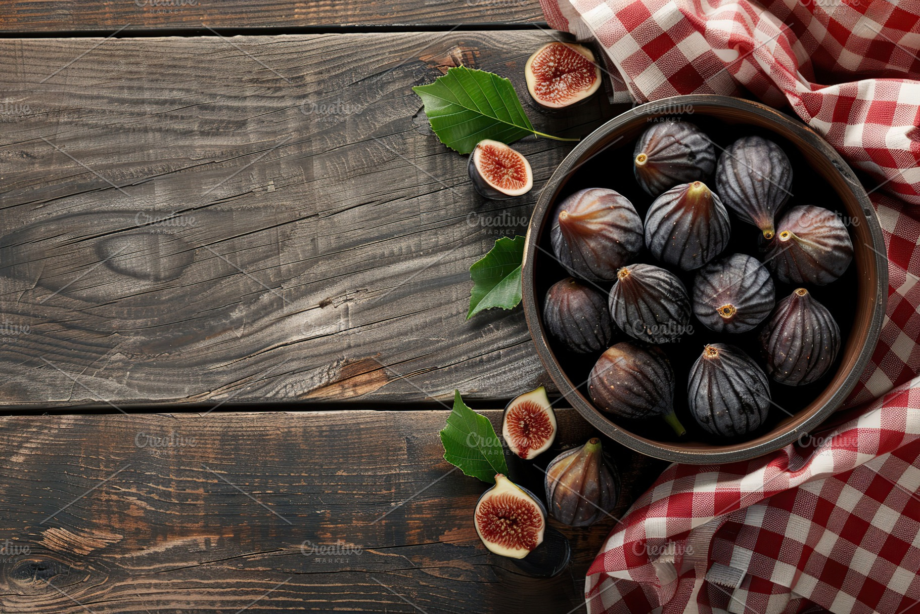 Fresh figs in bowl with copyspace on wooden table, a Food & Drink Photo by AlyaAnd