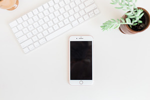 Iphone styled stock flatlay containing iphone, keyboard, and flatlay