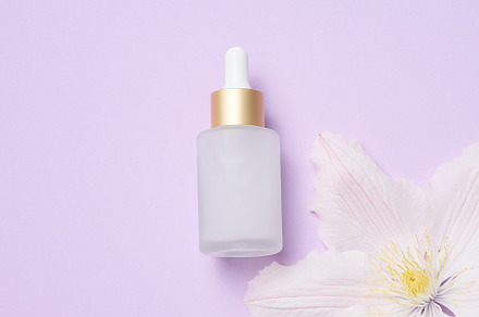 White glass bottle with pipette for cosmetics, oils and serum. A, a Beauty & Fashion Photo by ndanko