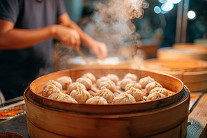 Steaming dumplings in a bamboo basket in a bustling kitchen setting, a Food & Drink Photo by AlyaAnd