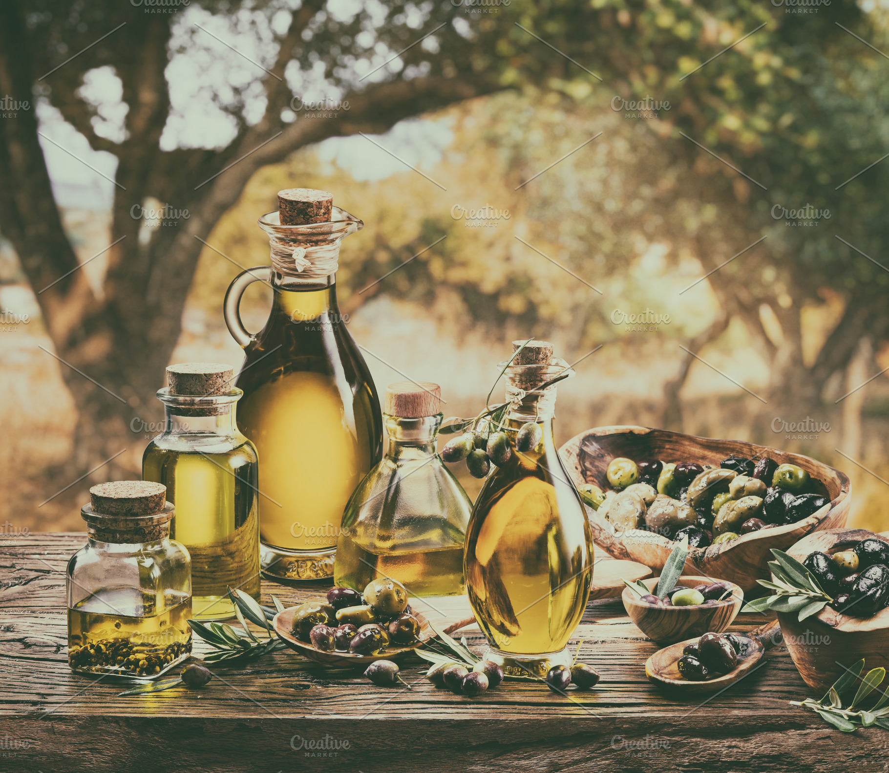 Bottle of craft farm olive oil stands on a wooden table, behind, a Food & Drink Photo by Volff