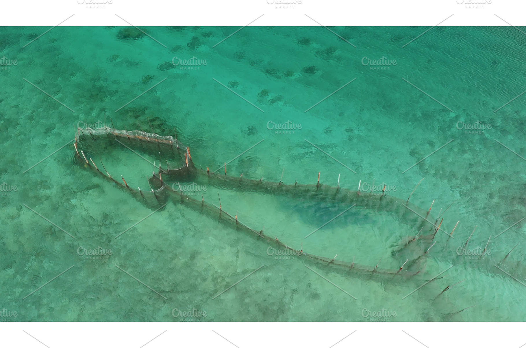 Fishing net submerged in shallow, a Nature Photo by Goinyk