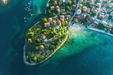 Overlooking the stunning coastal vil, a Photo by Tanuart