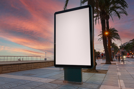 Blank billboard next to the beach