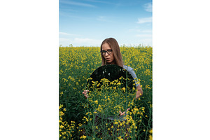 Woman with Mirror in Flower Field, a Graphic by Jan Jack Russo Media