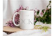 White Cup with Spring Flowers, a Product Mockup by MockupWizard (Thumbnail 1 of 3)