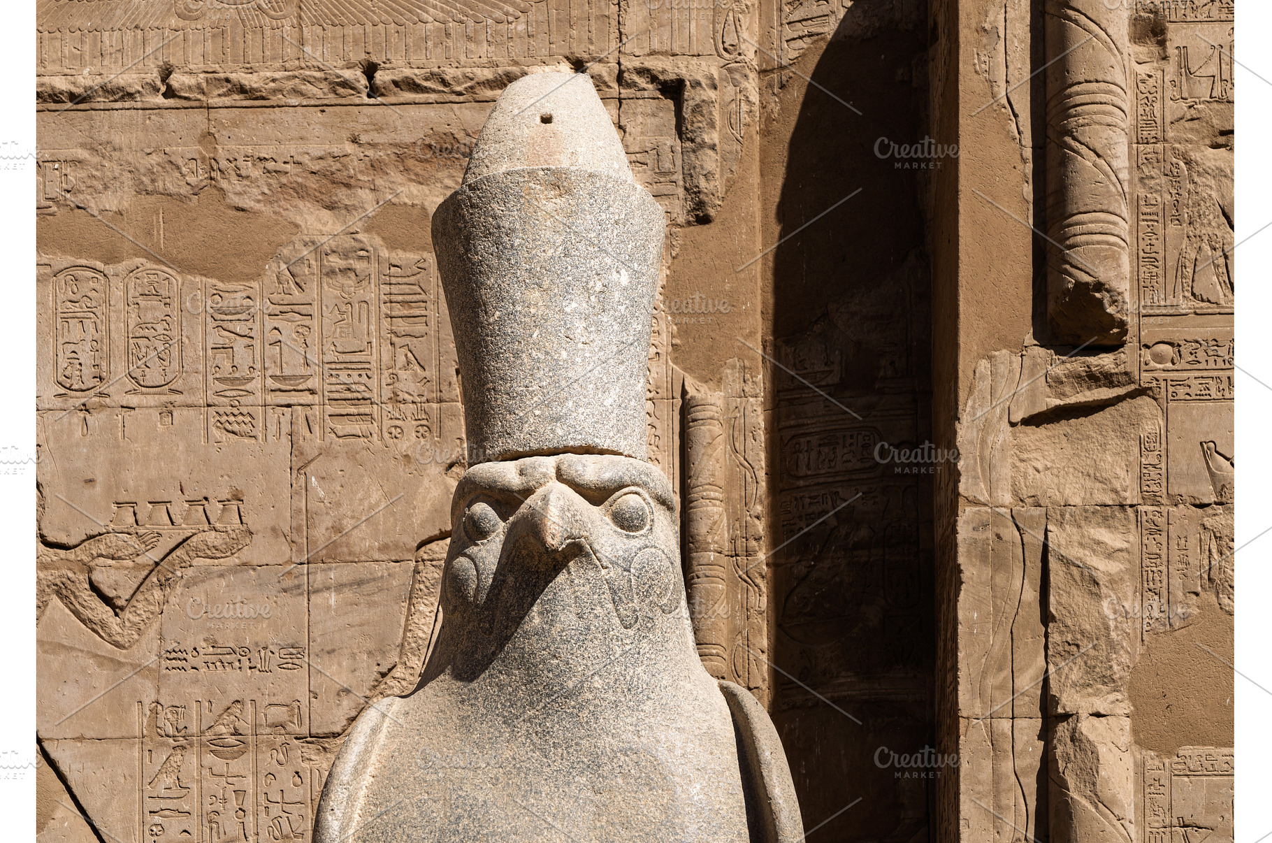 Detail of the statue of Horus by the, an Architecture Photo by Backyard Stock