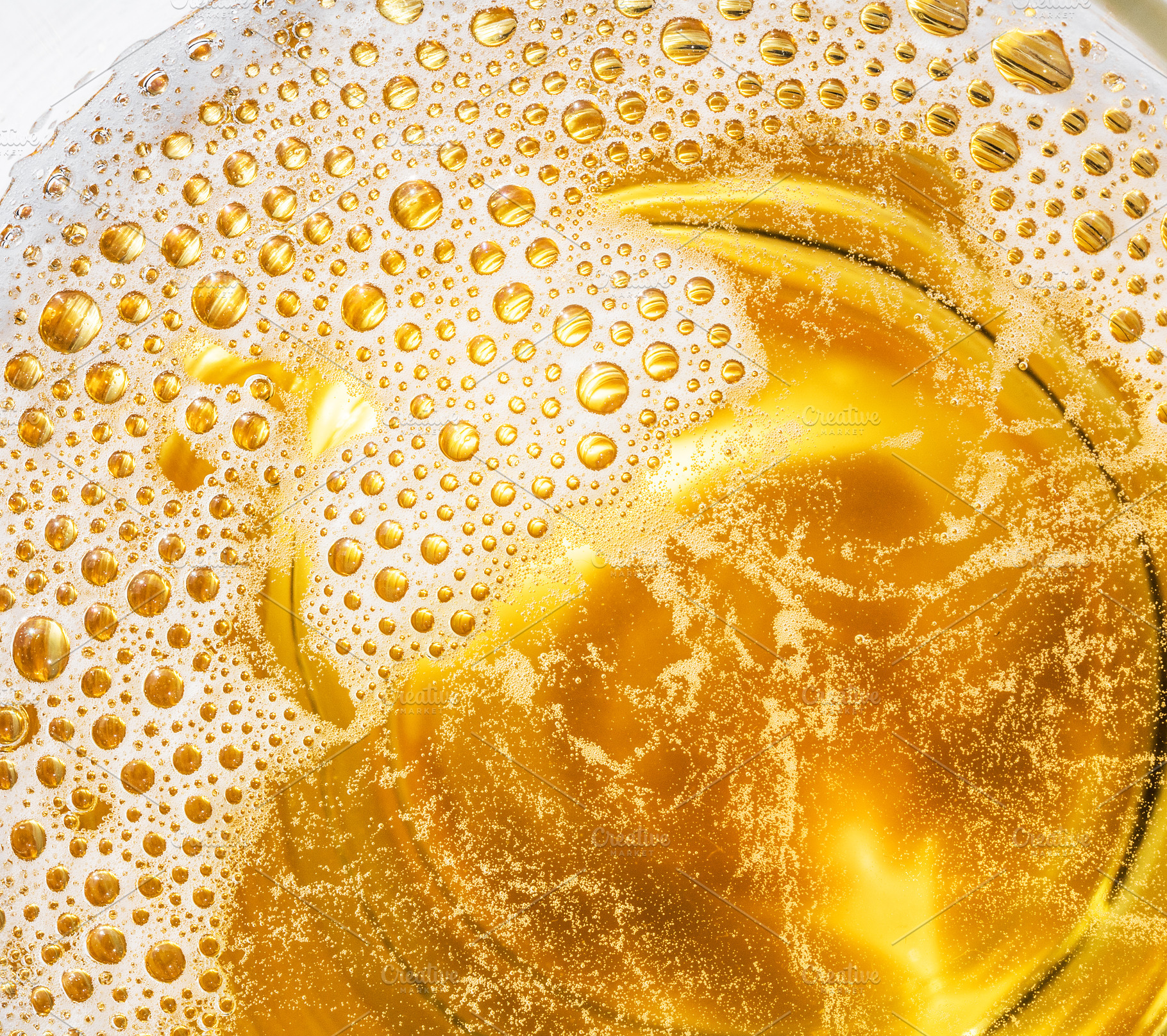Glass of beer. Top view of lager beer or light beer., a Food & Drink Photo by Volff