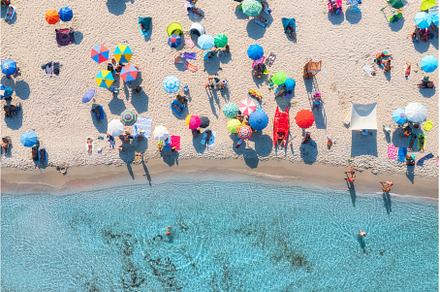 Aerial view of colorful umbrellas on, a Nature Photo by den-belitsky