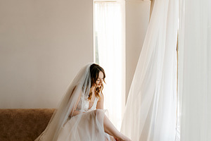 portrait of a bride in the morning before the wedding, a Person Photo by Weddings, People, Travel