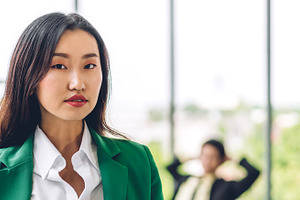Beautiful smiling confident asian businesswoman in smart casual
