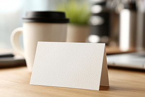 Blank white folded card mockup stand, a Food & Drink Photo by MistyDay