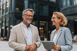 Happy business colleagues discussing, a Photo by Pixeness Studio
