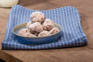 Rolled and sugared cookies with milk featuring food, baked, and baked goods