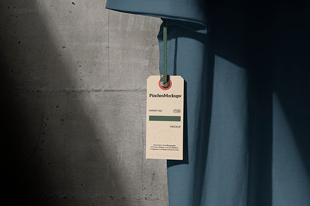Paper Tag Hangs from T-Shirt Mockup