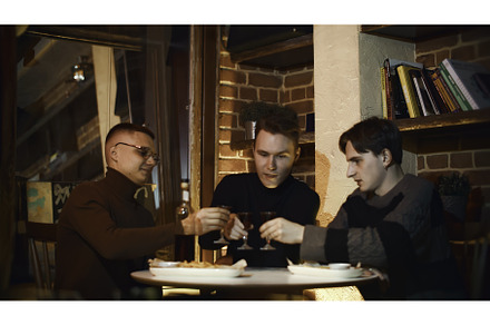 Three men are drinking in restaurant, a Person Photo by Media Whale Stock