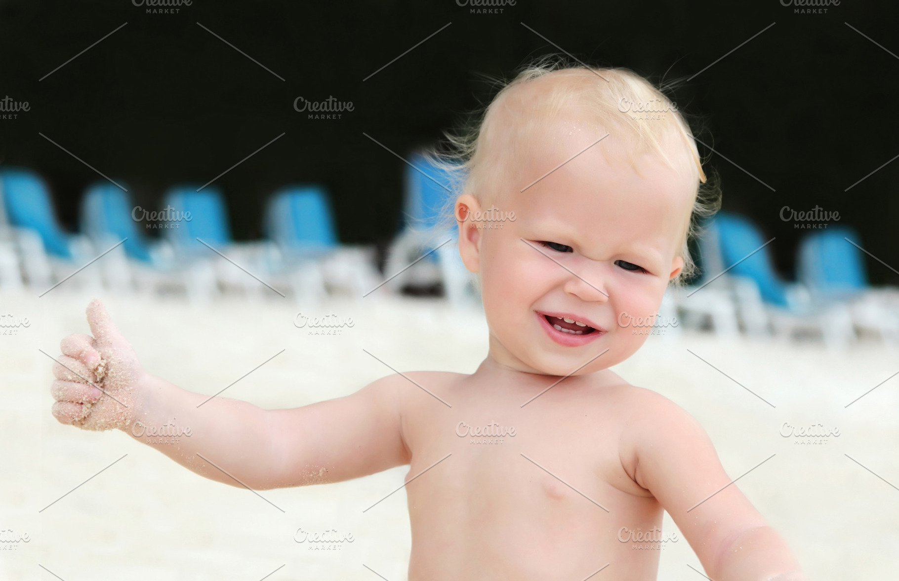 Baby on a beach, a Photo by saiko3p