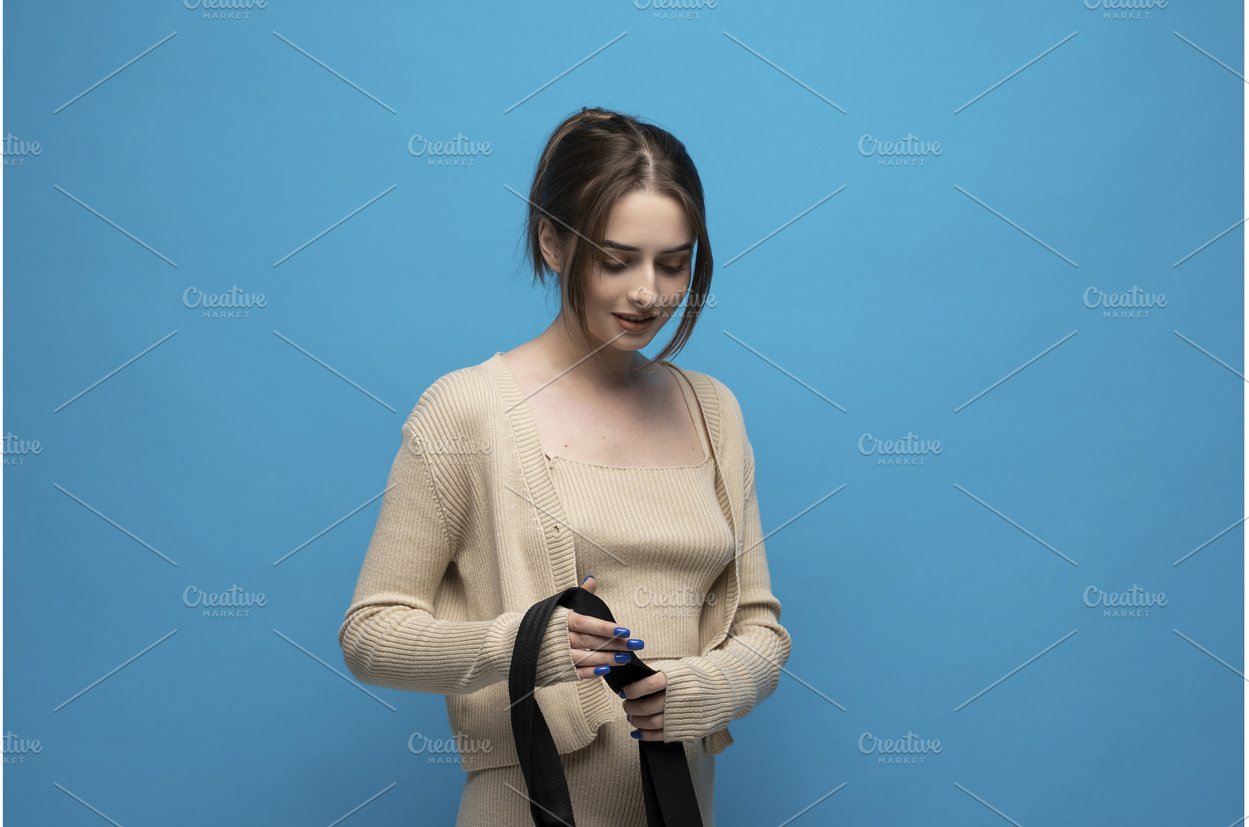 Young stylish woman in beige, a Beauty & Fashion Photo by volodymyrshtun13795