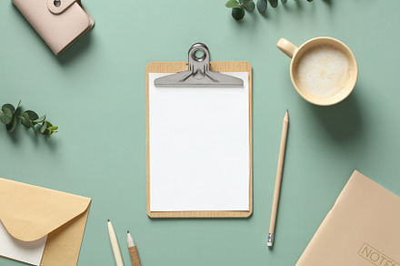 Aesthetic minimal office desk table with clipboard mockup, coffee cup, statione, a Holiday Photo by photoguns