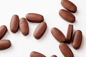 Pills on White, a Health & Medical Photo by THP Creative