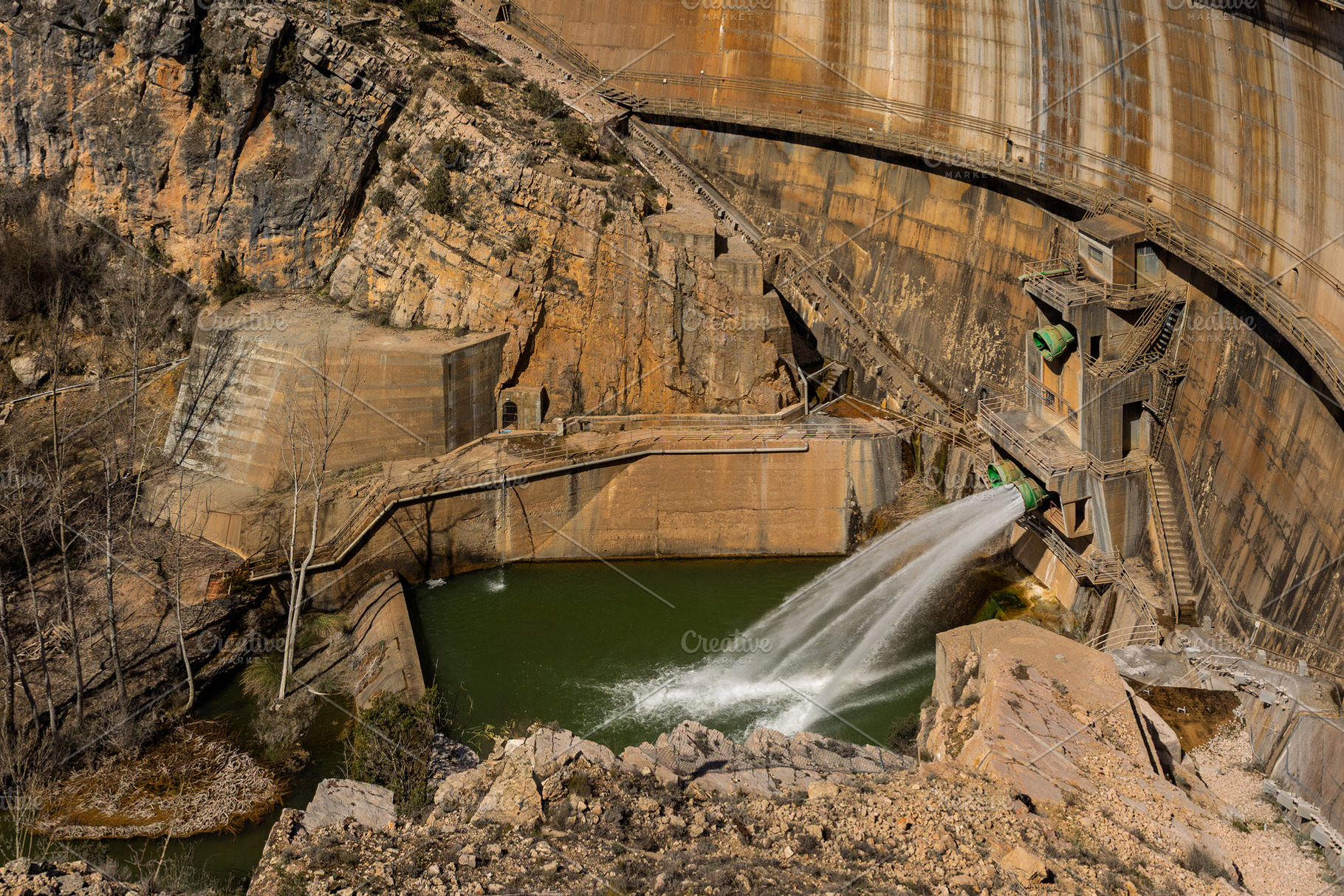 Water Discharge from a Concrete Dam, an Architecture Photo by Perpis