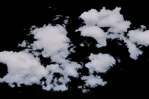 White fluffy clouds on a black isolated background, a Nature Photo by ndanko