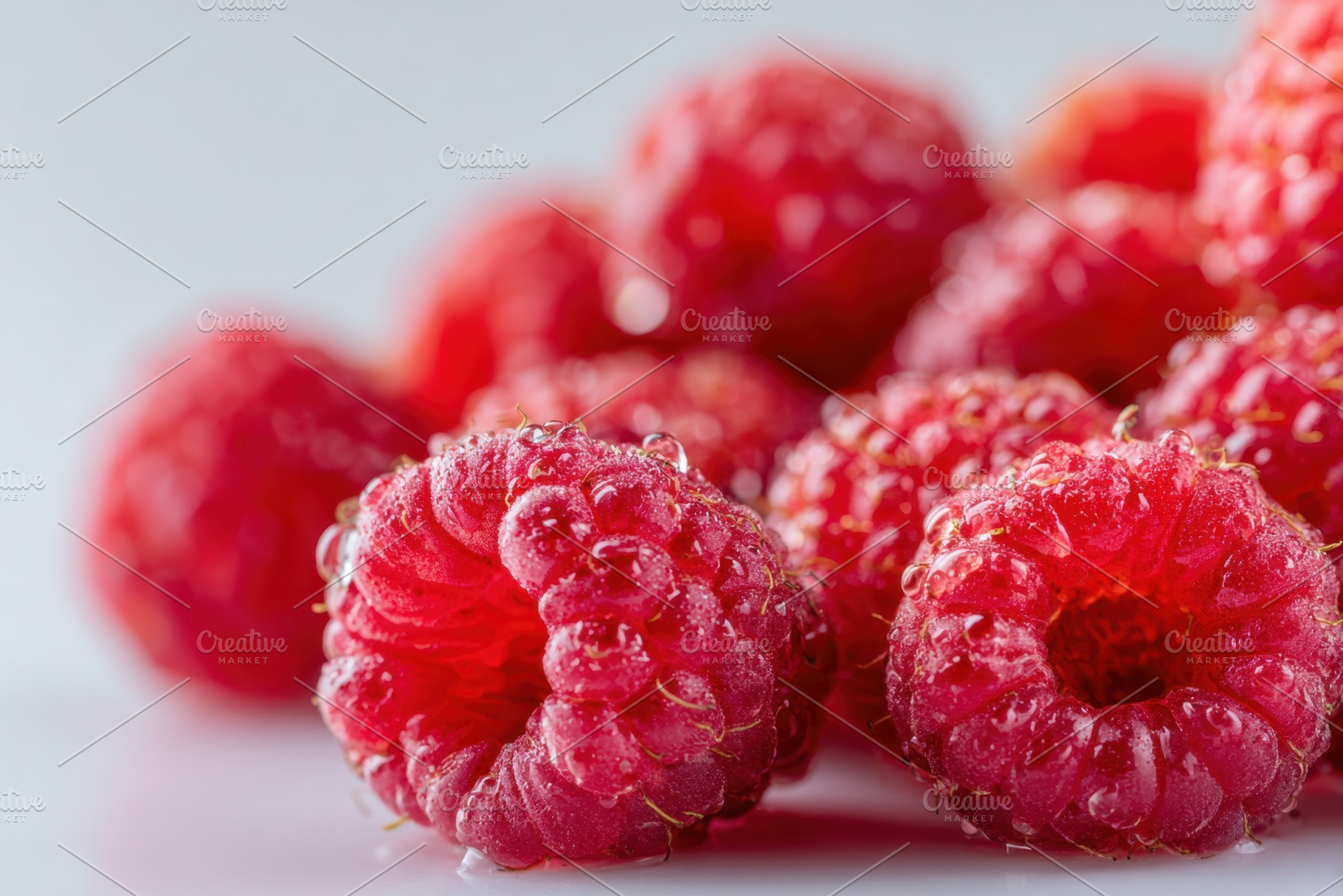 Fresh and ripe red raspberries, a Food & Drink Photo by AlyaAnd