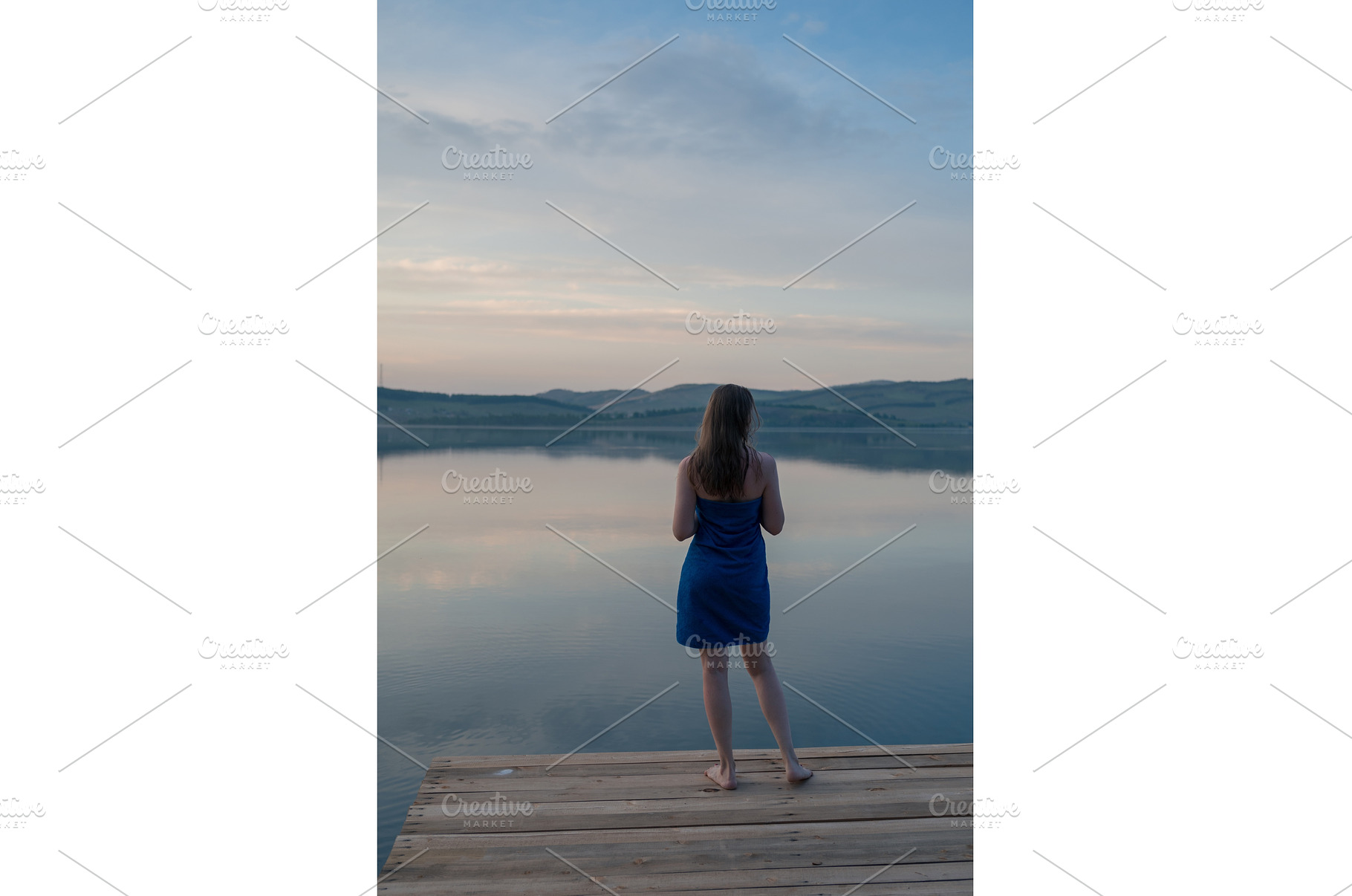 Woman in Blue Towel Sitting on Dock, a Person Photo by Jan Jack Russo Media