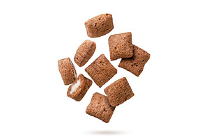 Chocolate corn pads flying on a, a Food & Drink Photo by innakreativ