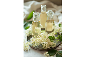 Elderflower syrup bottles with fresh, a Food & Drink Photo by Lermont51
