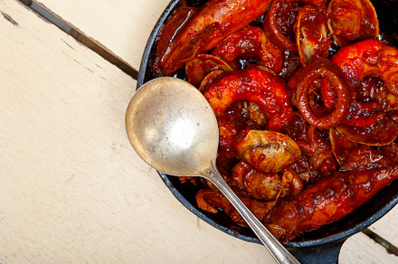 fresh seafoos stew on an iron skillet, a Food & Drink Photo by keko64