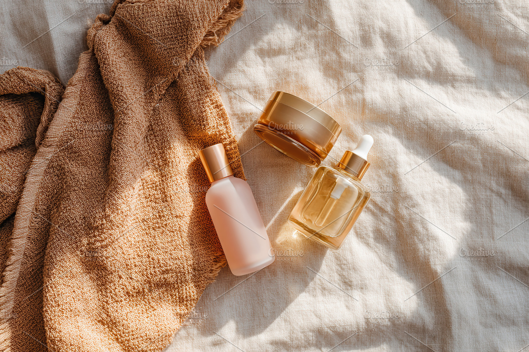 Luxury skincare products arranged on soft linen fabric for an elegant setting, a Health & Medical Photo by AlyaAnd