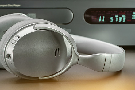 Music player, CD and headphones.