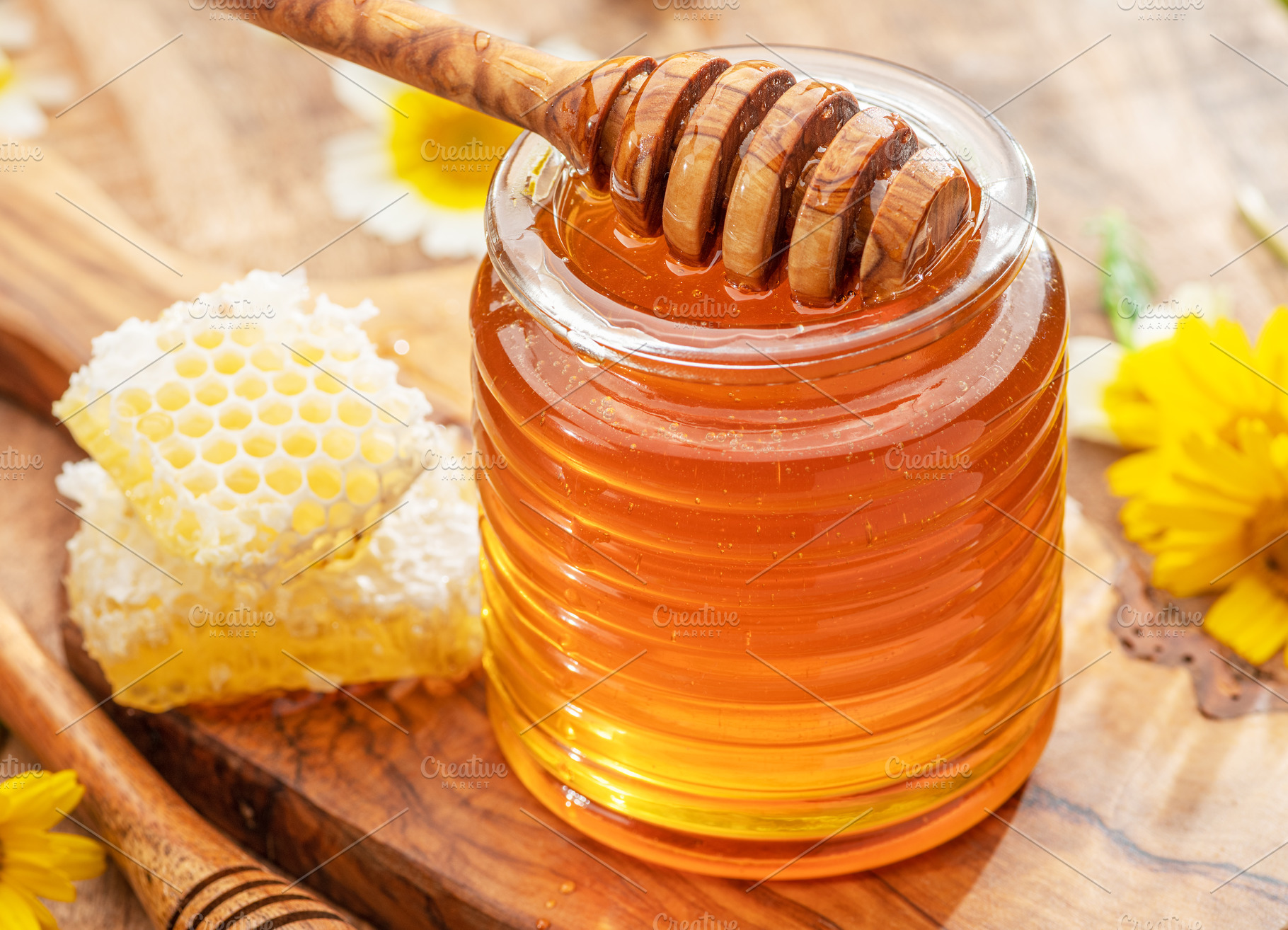 Natural organic honey in glass jar, a Food & Drink Photo by Volff