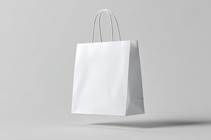 Shopping bag floating in space, a Photo by Beautiful things