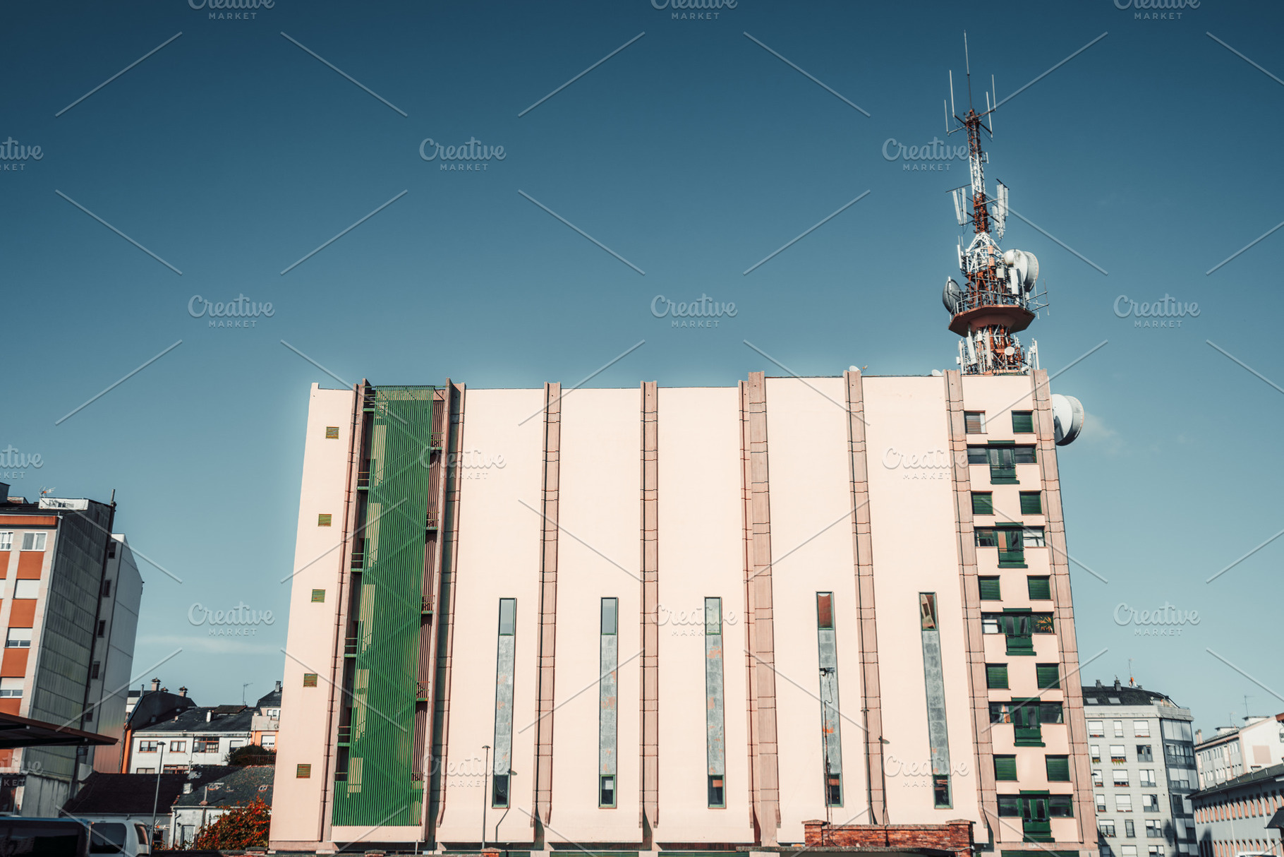 Building with telecom tower, an Architecture Photo by SkyNext