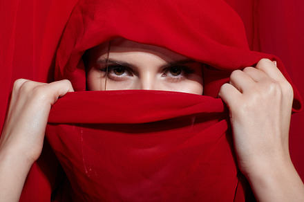 Portrait of young woman wrapped in red cloth., a Beauty & Fashion Photo by Zastavkin