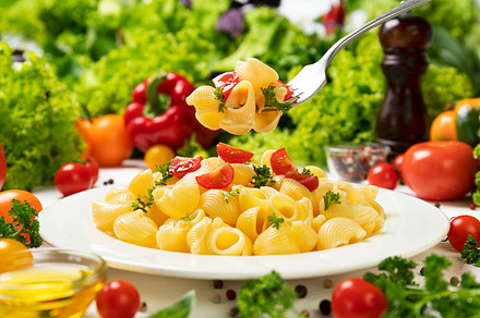 Plate of italian pasta, pipe rigate, a Food & Drink Photo by Max Lashcheuski